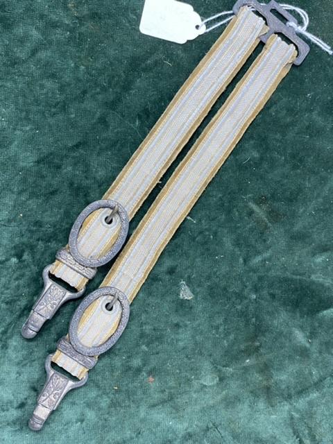 PAIR OF ARMY DAGGER HANGERS WITH WIDER STRAPS.