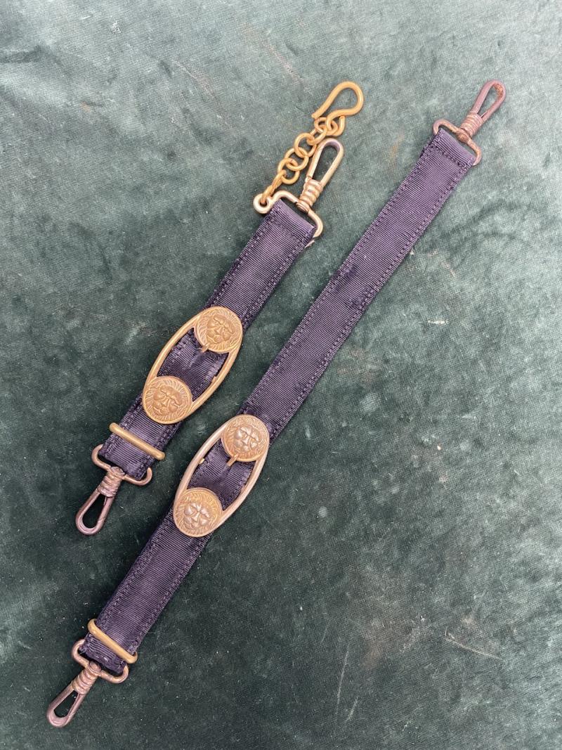 A PAIR OF EARLY BRASS KRIEGSMARING DAGGER HANGERS - MATCHED SET.