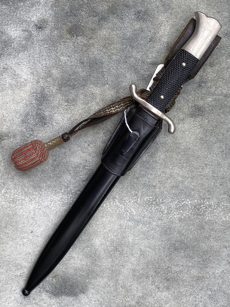 A RARE SAW-BACK FIRE BAYONET WITH EVEN RARER MAKER!