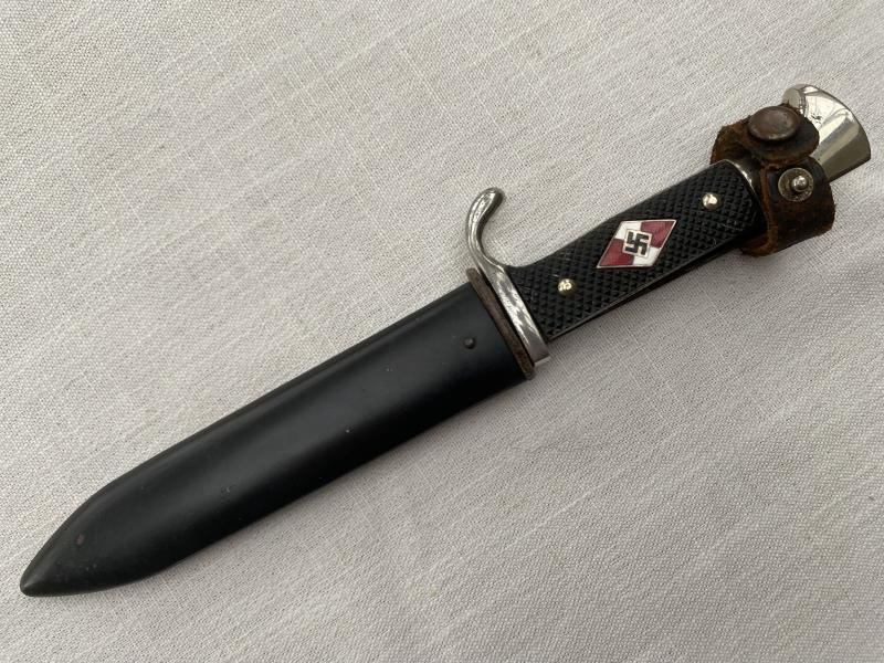 A NEAR MINT EXAMPLE OF A HJ DAGGER WITH MOTTO.
