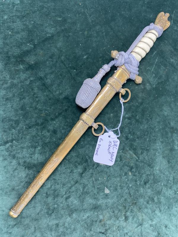 A NAVY DAGGER BY WKC WITH ORIGINAL KNOT.