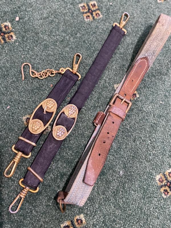 MATCHED PAIR OF THIRD REICH ERA NAVAL DAGGERS HANGERS WITH CLOTH UNDER-BELT.