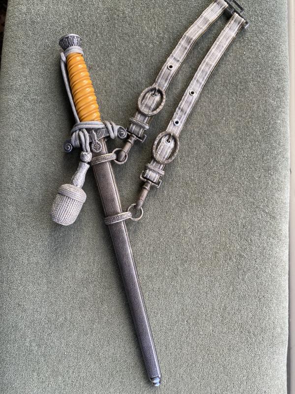AN EXCELLENT, NEAR MINT EXAMPLE OF AN ALCOSO ARMY DAGGER WITH STRAPS & KNOT.