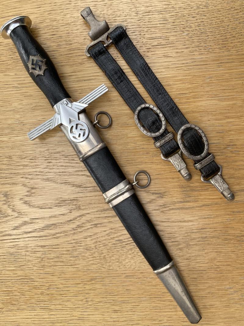A MINT EXAMPLE OF A RLB OFFICERS DAGGER BY ERNST WITTE WITH MATCHING MINT STRAPS.