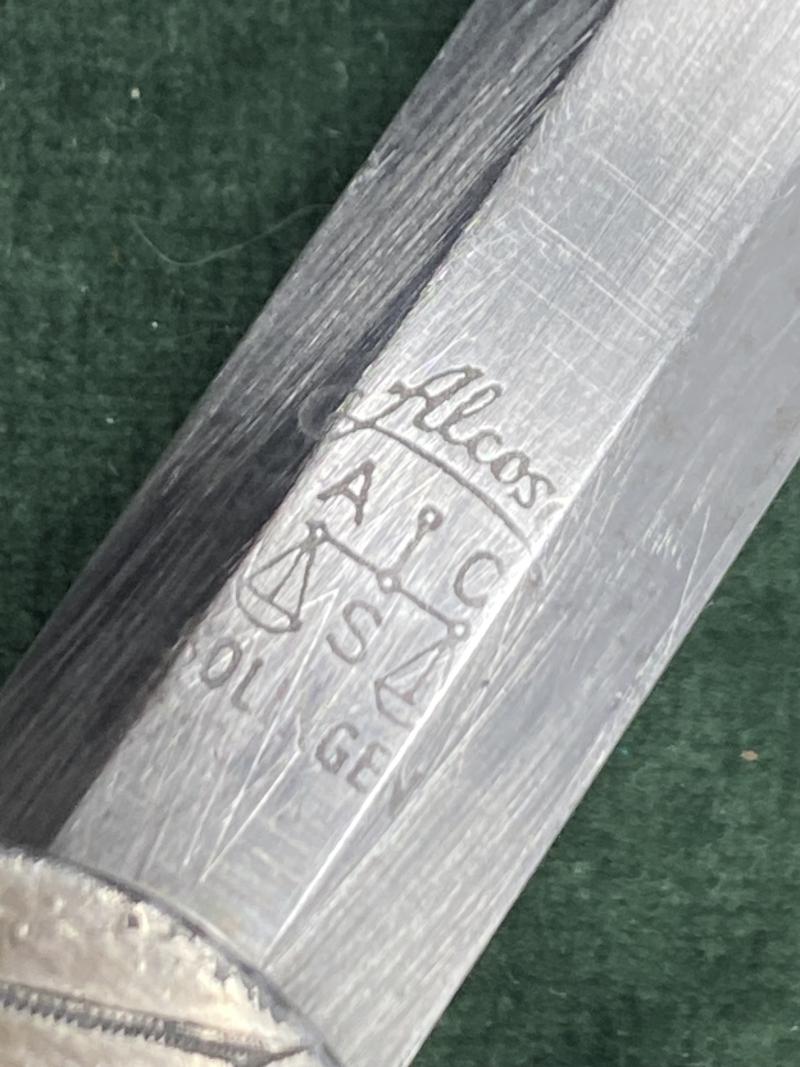 A PERSONALISED/NAMED ARMY DAGGER IDENTIFIED TO AN OFFICER BY ALCOSO WITH STRAPS AND KNOT.