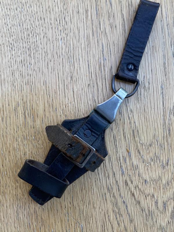 AN ORIGINAL- MARKED BLACK SS VERTICAL DAGGER HANGER.