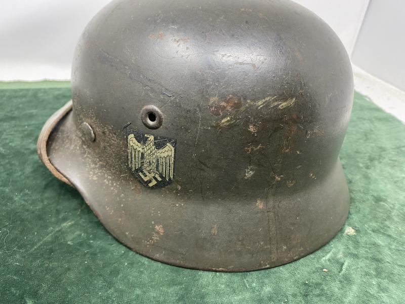 AN UNTOUCHED EXCELLENT EXAMPLE OF A SINGLE DECAL WEHRMACHT M40 STEEL HELMET.