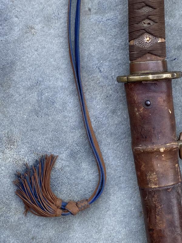 WW2 JAPANESE OFFICERS KATANA/SAMURAI SWORD WITH BATTLE COVER AND ORIGINSL ‘KNOT’