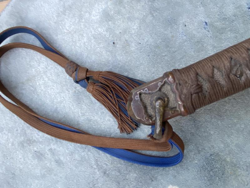 WW2 JAPANESE OFFICERS KATANA/SAMURAI SWORD WITH BATTLE COVER AND ORIGINSL ‘KNOT’