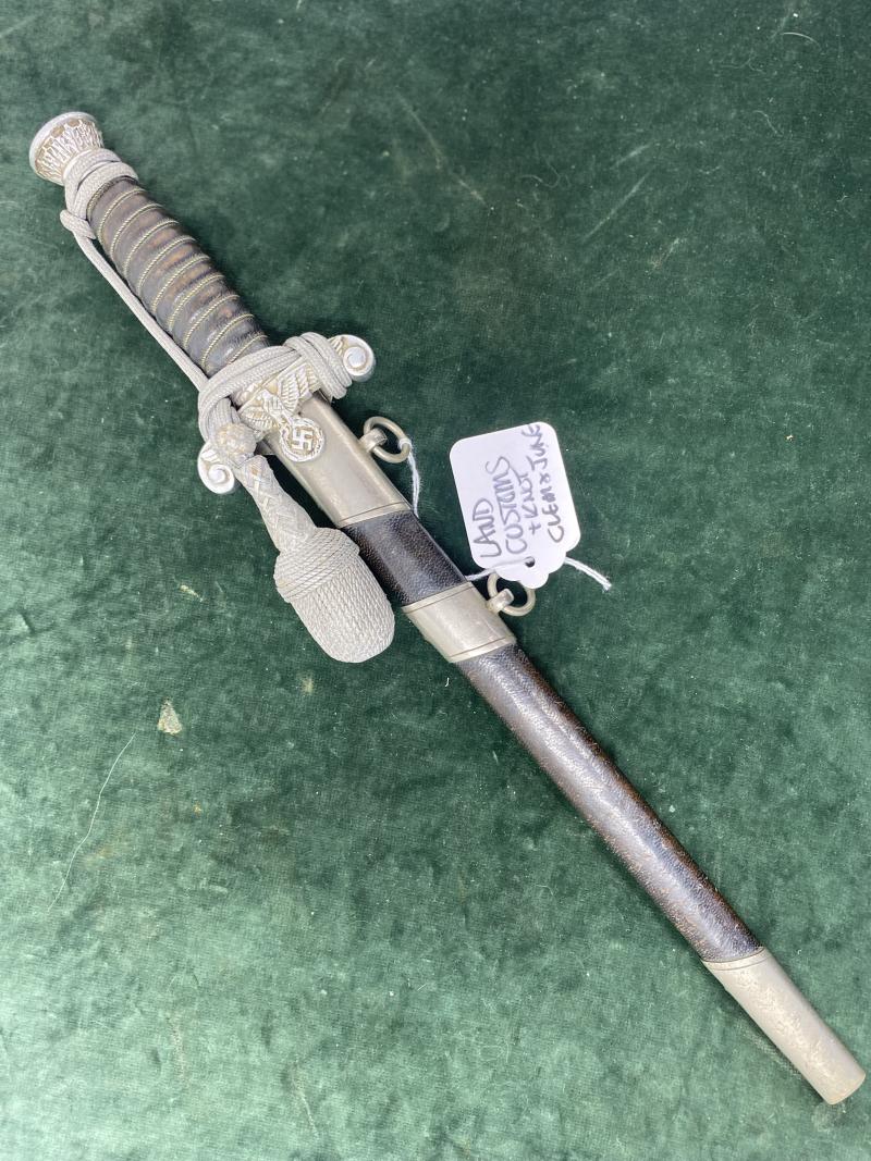 LAND CUSTOMS DAGGER WITH KNOT BY CLEM & JUNG.