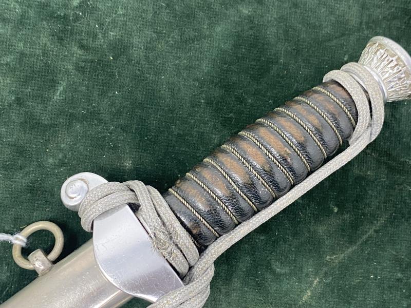 LAND CUSTOMS DAGGER WITH KNOT BY CLEM & JUNG.