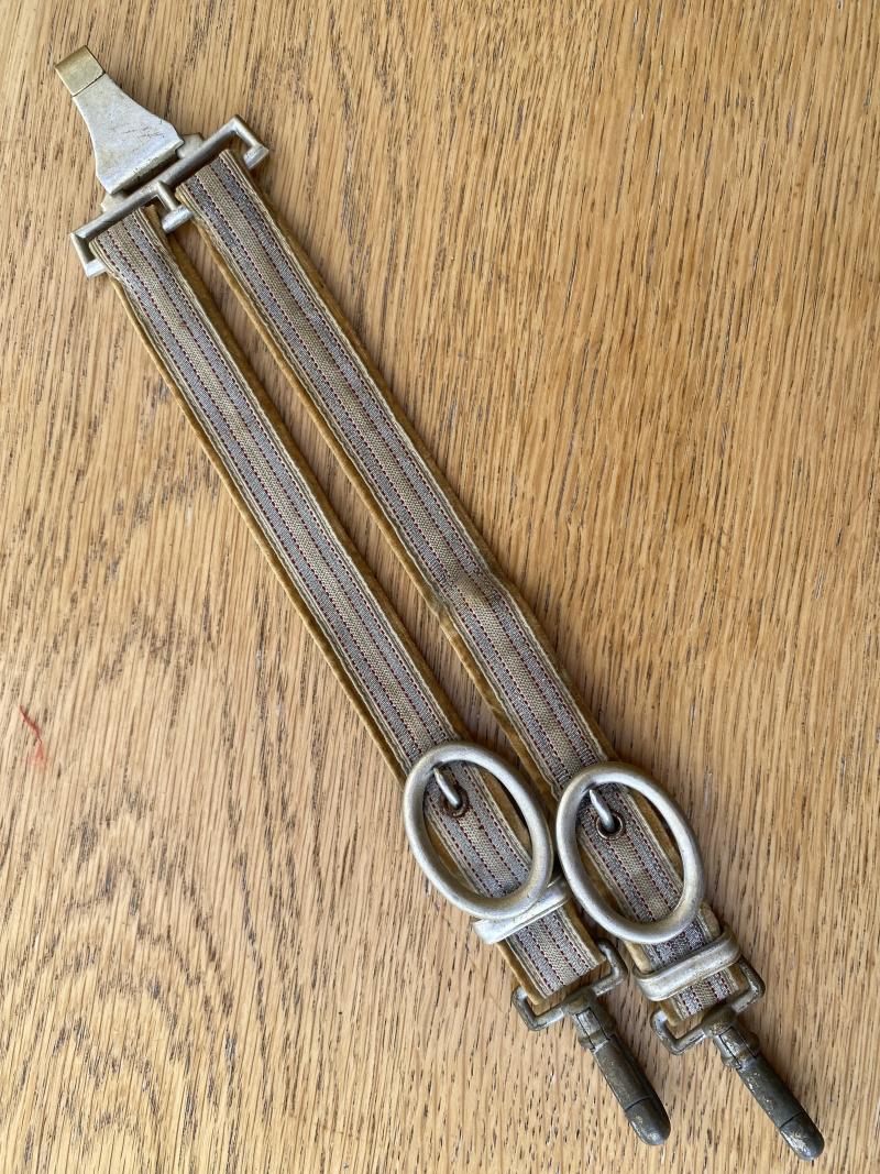 A SUPERB SET OF RED CROSS OFFICERS DAGGER HANGERS.