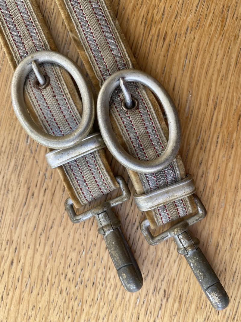 A SUPERB SET OF RED CROSS OFFICERS DAGGER HANGERS.