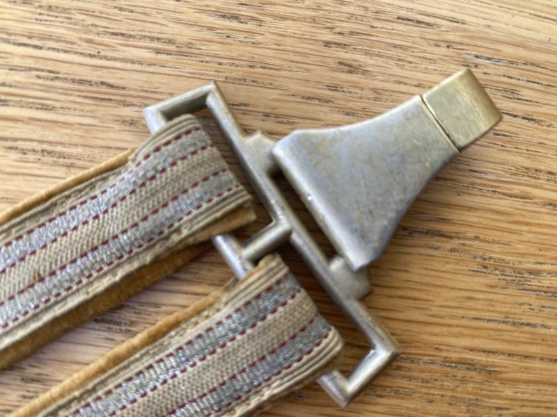 A SUPERB SET OF RED CROSS OFFICERS DAGGER HANGERS.