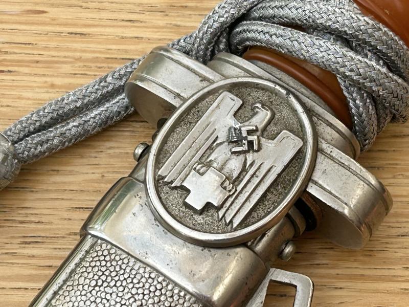 A BEAUTIFUL RED CROSS OFFICERS DAGGER WITH KNOT.