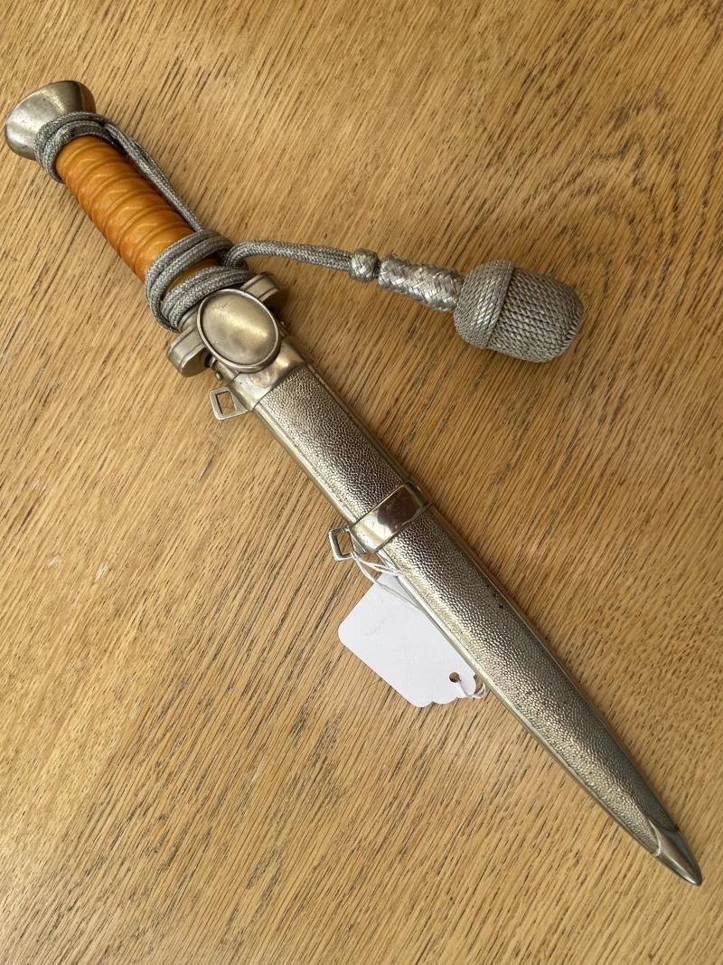 A BEAUTIFUL RED CROSS OFFICERS DAGGER WITH KNOT.