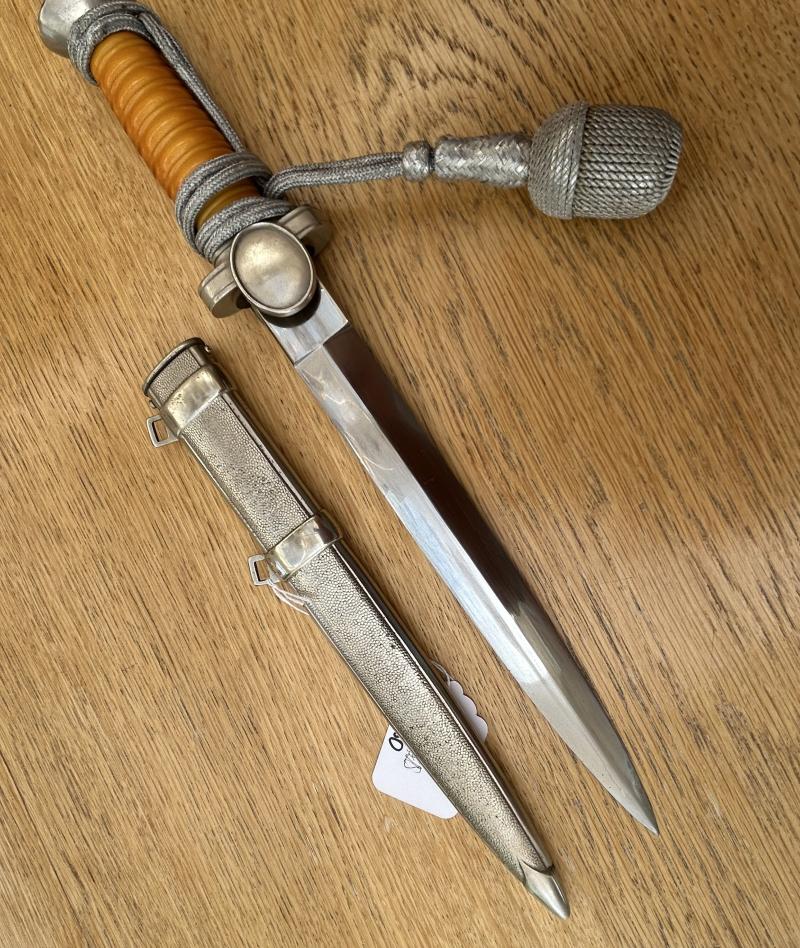 A BEAUTIFUL RED CROSS OFFICERS DAGGER WITH KNOT.