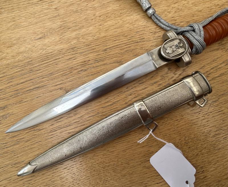 A BEAUTIFUL RED CROSS OFFICERS DAGGER WITH KNOT.