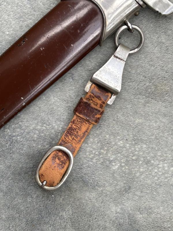 A NEAR MINT ‘TRANSITIONAL’ SA DAGGER BY HOLLER.