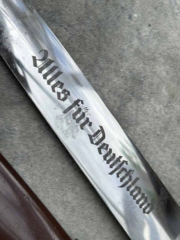 A NEAR MINT ‘TRANSITIONAL’ SA DAGGER BY HOLLER.