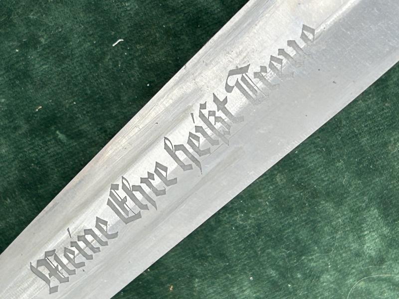 AN EARLY SS ‘33 DAGGER WITH ORIGINAL VERTICAL HANGER BY HERDER.