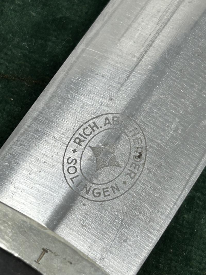 AN EARLY SS ‘33 DAGGER WITH ORIGINAL VERTICAL HANGER BY HERDER.