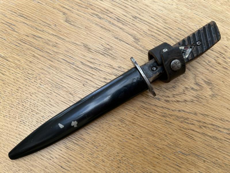 FIGHTING KNIFE WITH ADDED HJ BADGE.