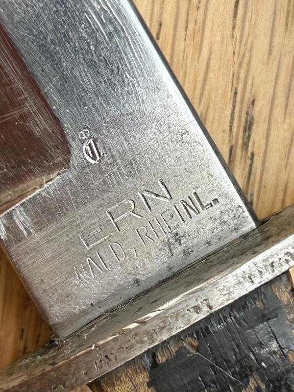 FIGHTING KNIFE WITH ADDED HJ BADGE.