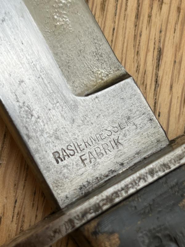 FIGHTING KNIFE WITH ADDED HJ BADGE.