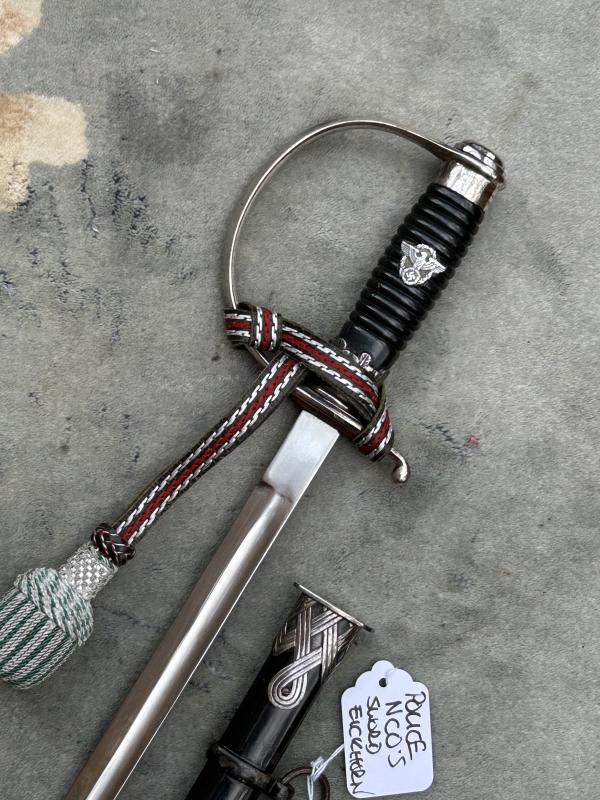 A NEAR MINT EXAMPLE OF A LONG POLICE NCO’s PARADE DEGEN BY EICKHORN.
