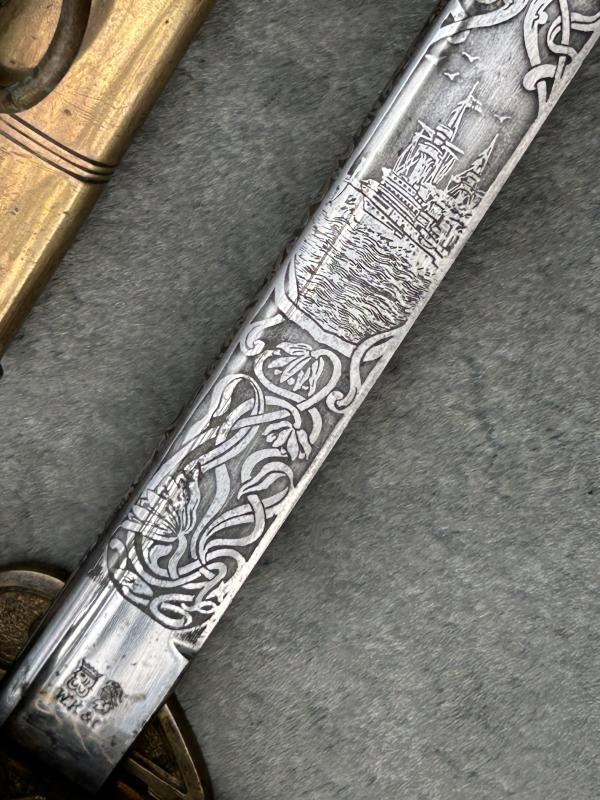 A NAMED IMPERIAL GERMAN NAVAL SWORD BY WK&C. FULLY ETCHED BLADE ETC.