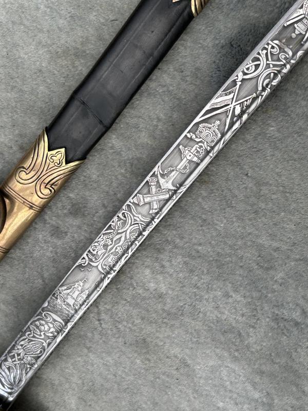 A NAMED IMPERIAL GERMAN NAVAL SWORD BY WK&C. FULLY ETCHED BLADE ETC.